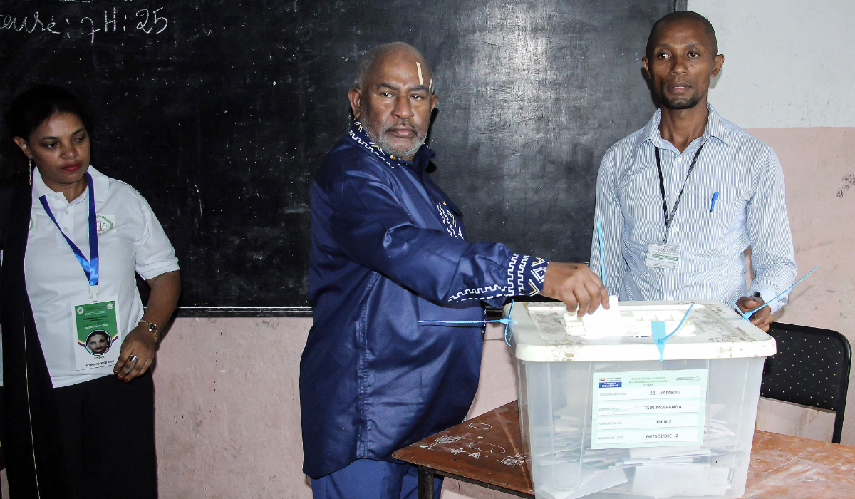 President of the Comoros Azali Assoumani (C) casts his ballot at a polling station in Mitsoudje on January 12, 2025, during the Comorian parliamentary election. (AFP)