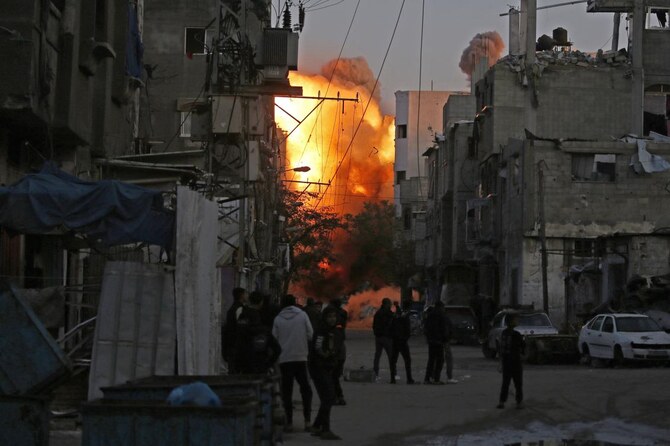 Smoke rises from a building destroyed in Israeli airstrike at the Bureij camp for Palestinian refugees in the central Gaza Strip on January 12, 2025. (AFP)