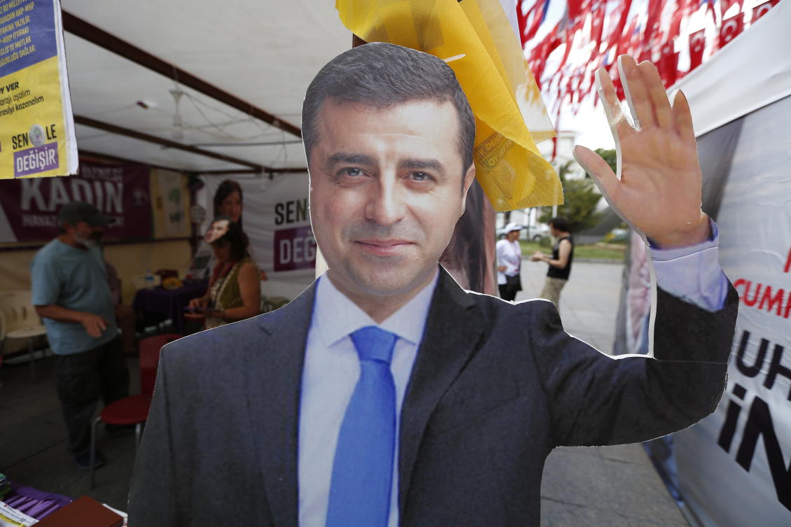 A cardboard cut-out of Selahattin Demirtas is pictured at an election kiosk in Istanbul, June 20, 2018. (AP)