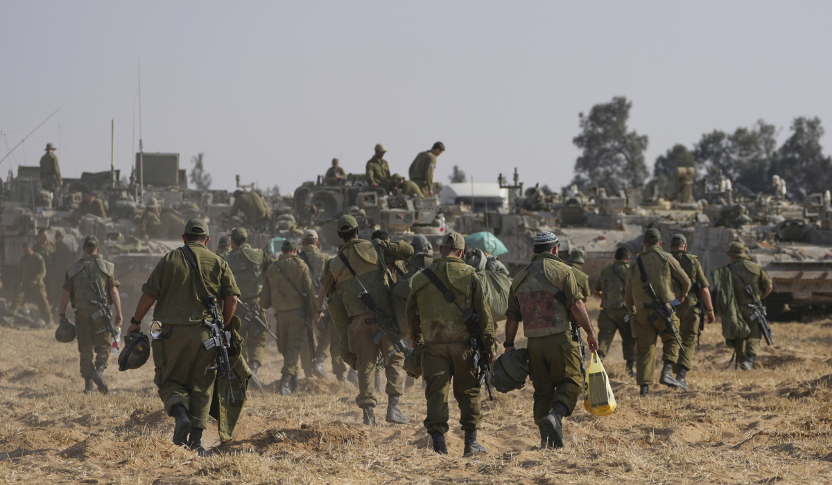 Israeli soldiers are seen at a staging ground near the border with the Gaza Strip, in southern Israel, Tuesday, April 30, 2024. (AP)