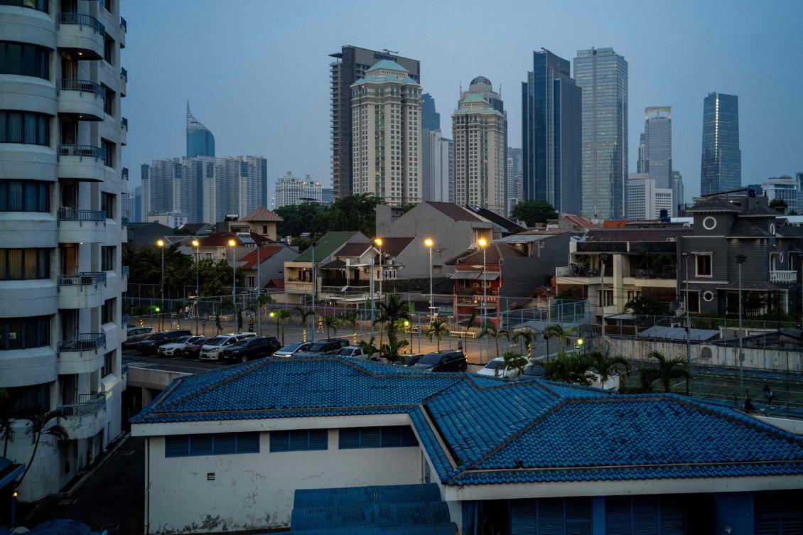 This picture taken on November 13, 2024 shows upper-middle-class houses seen located close to office buildings in Jakarta. Scrolling on social media, Indonesian moviegoer Jessica Sihotang stumbled across a film depicting a fellow woman in her 30s struggling to make the dream of buying a Jakarta home a reality. (AFP)