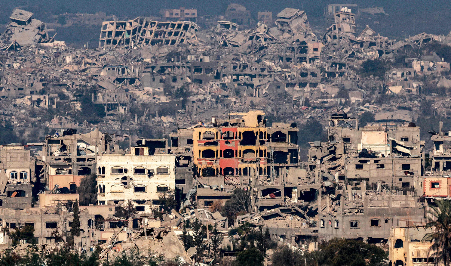 This picture taken from the Israeli side of the border with the Gaza Strip shows destroyed buildings in the northern Gaza Strip on January 13, 2025. (AFP)