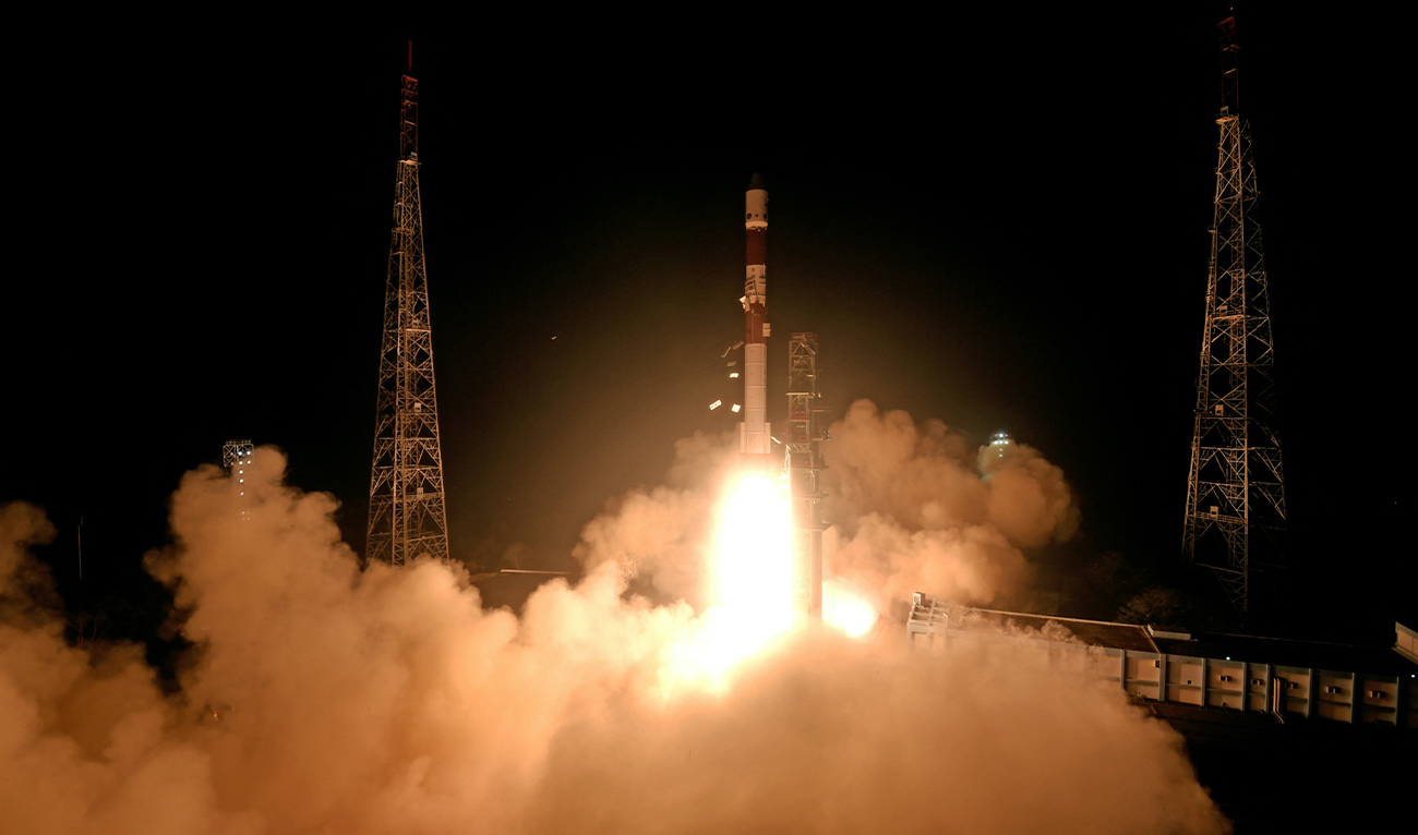 This handout photograph taken and released on December 30, 2024 by the Indian Space Research Organisation (ISRO) shows the launch of the ISRO PSLV-C60 rocket carrying two SpaDeX satellites SDX01 (Chaser) and SDX02 (Target) from the Satish Dhawan Space Centre in Sriharikota. (Indian Space Research Organisation/AFP)