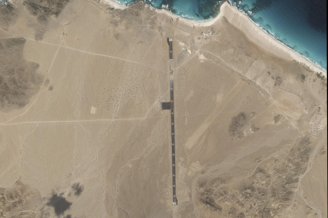 The airstrip on Abd Al-Kuri Island, which rises out of the Indian Ocean near the mouth of the Gulf of Aden, could provide a key landing zone for military operations patrolling that waterway. (Planet Labs PBC via AP)