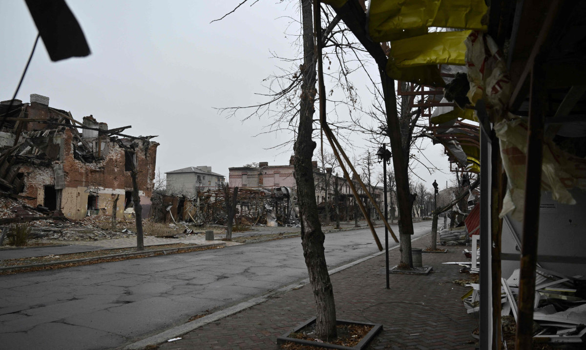 This photograph shows damaged buildings and shops in the town of Lyman, near the frontline in the Donetsk region, on January 17, 2025, amid the Russian invasion of Ukraine. (AFP)