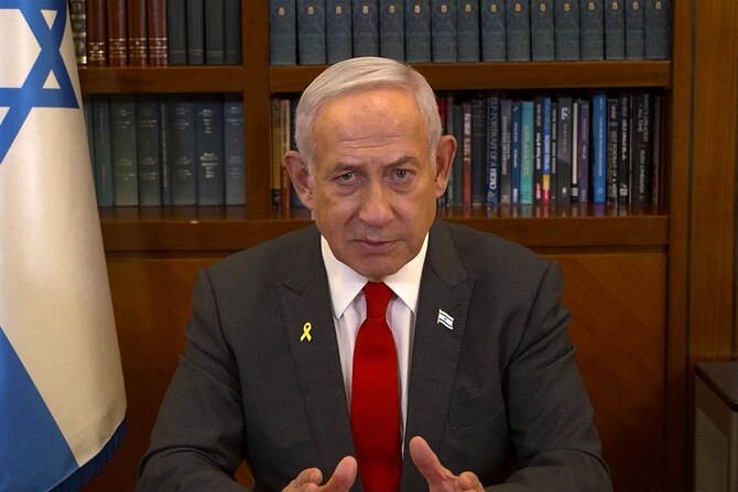This image grab from handout video footage released by the Israeli Government Press Office (GPO) shows Prime Minister Benjamin Netanyahu giving a televised address in Jerusalem on January 18, 2025. (AFP)