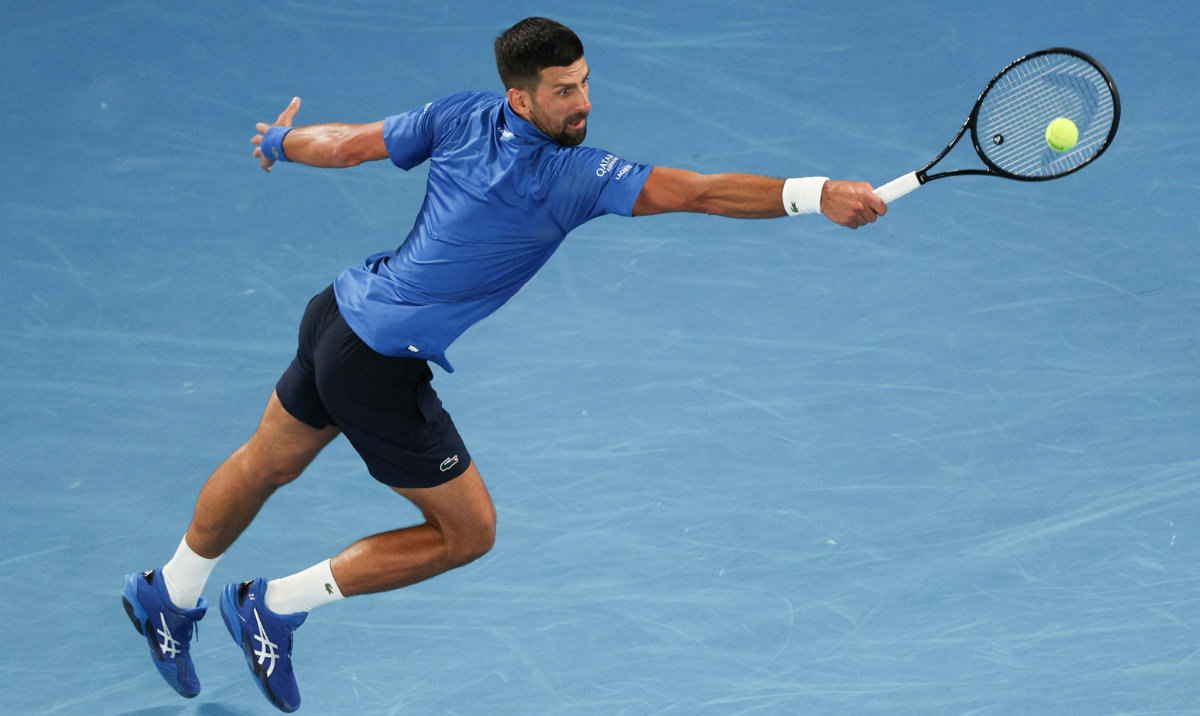 Serbia's Novak Djokovic hits a return against Czech Republic's Jiri Lehecka during their men's singles match on day eight of the Australian Open tennis tournament in Melbourne on January 19, 2025. (AFP)