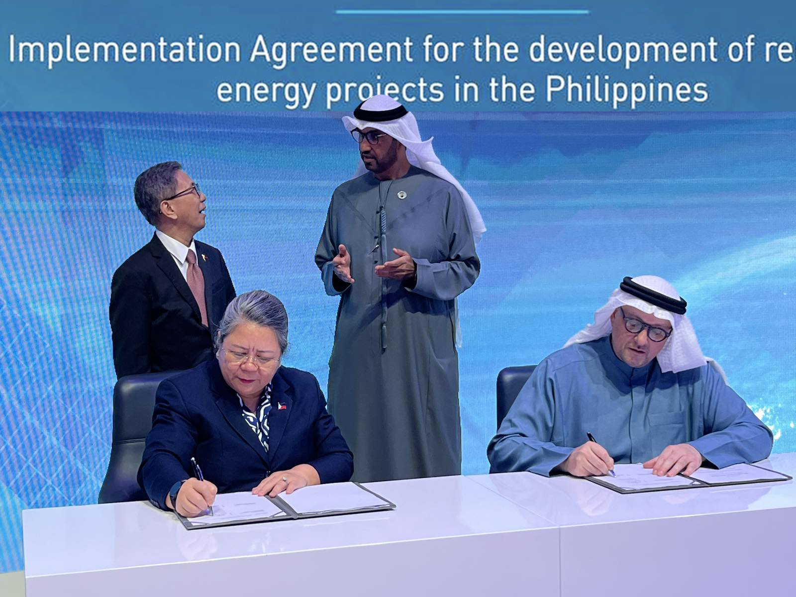 Philippines' Department of Energy Undersecretary Dr. Rowena Cristina L. Guevara and Masdar’s Chief Executive Officer Mohamed Jameel Al Ramahi sign an implementation agreement in Abu Dhabi on Jan. 15, 2025. (Department of Energy)