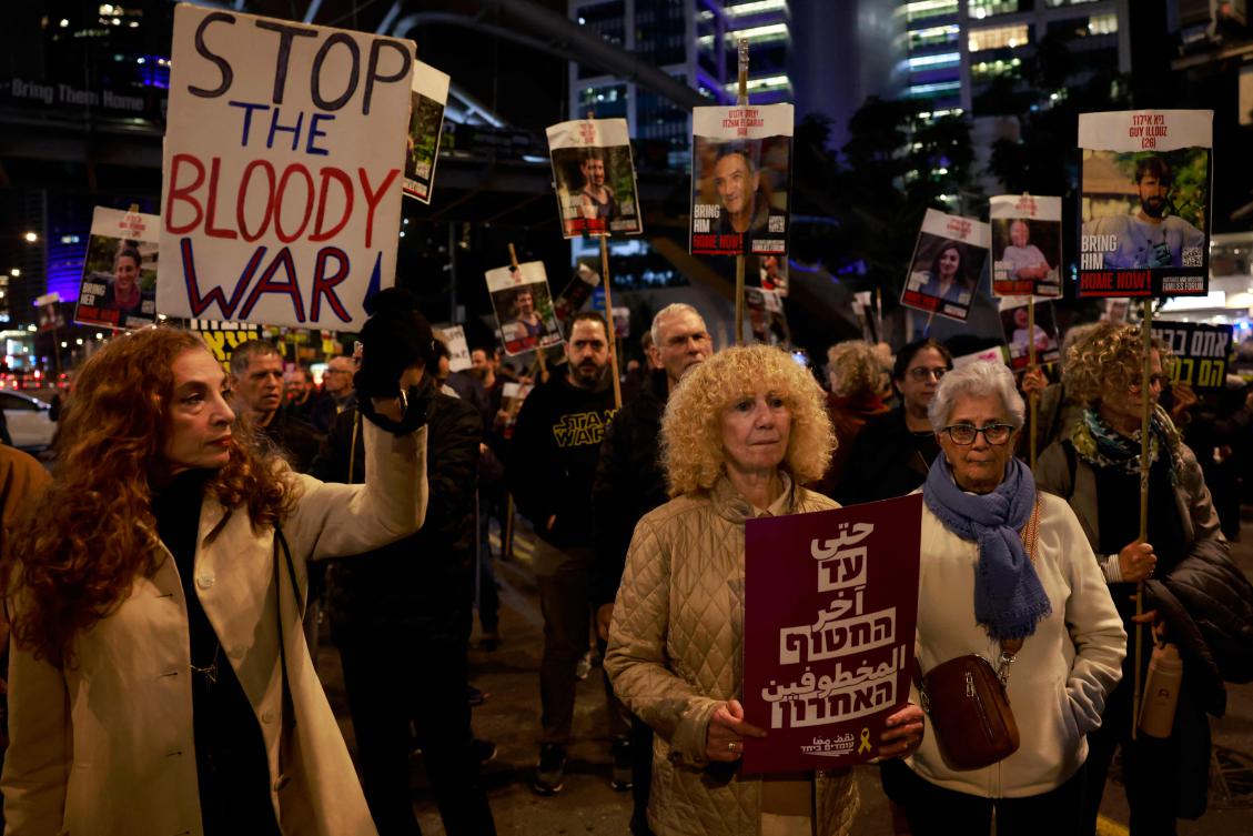 Supporters and relatives of Israeli hostages held captive in the Gaza Strip demonstrate in Tel Aviv on January 20, 2025, calling for an immediate end to the war and return of all the hostages. (AFP)