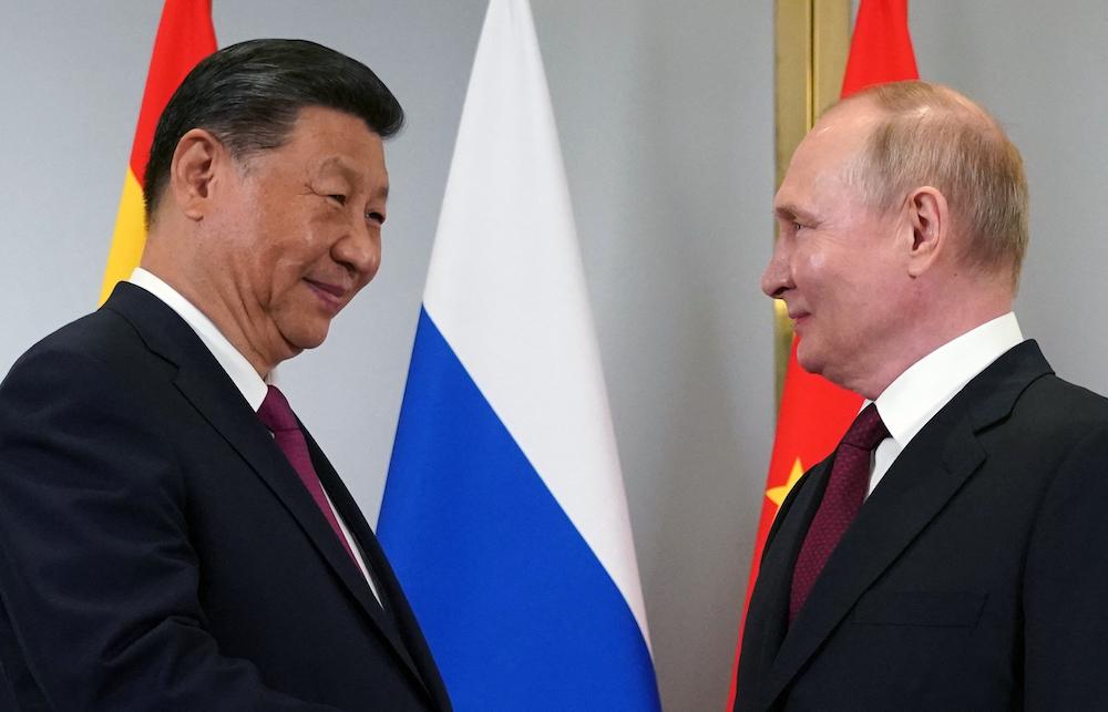 Chinese President Xi Jinping, left, and his Russian counterpart Vladimir Putin on Tuesday held a video call, Beijing’s state media reported. (AFP file photo)