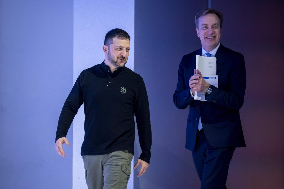 Ukraine’s President Volodymyr Zelensky and World Economic Forum President and CEO Borge Brende during the WEF annual meeting in Davos on Jan. 21, 2025. (AFP)