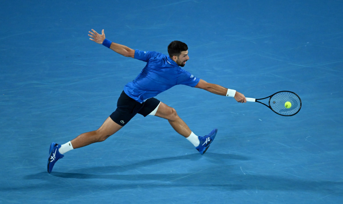 The 37-year-old Serb outlasted the Spaniard despite having his left thigh heavily strapped. (Reuters)