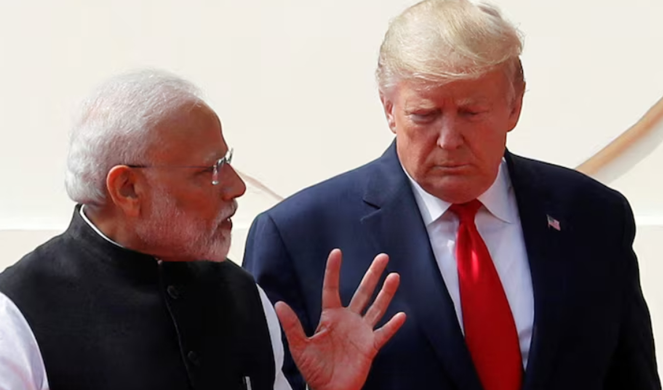 US President Donald Trump and India’s Prime Minister Narendra Modi talk as they arrive for a joint news conference after bilateral talks at Hyderabad House in New Delhi on February 25, 2020. (REUTERS/File)