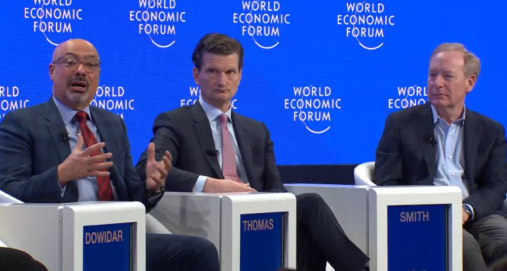 Hatem Dowidar, KPMG CEO Bill Thomas and Brad Smith participate in the ‘AI: Lifting All Boats’ panel at WEF 2025. (Screengrab/YouTube)