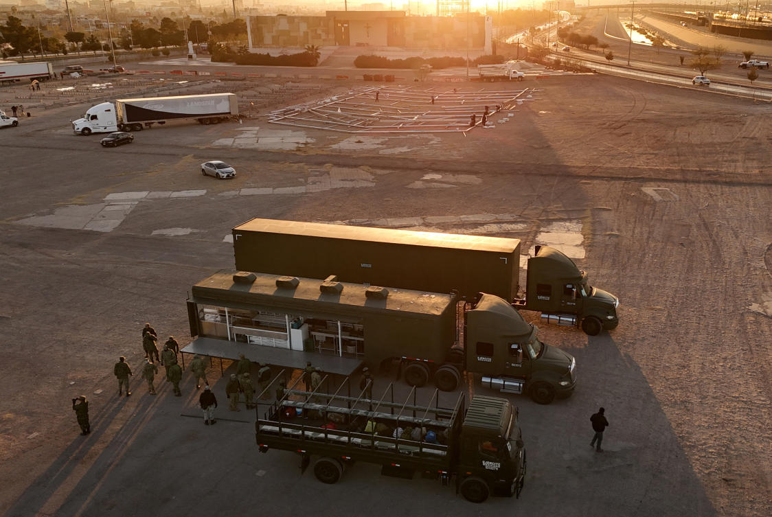 A drone view shows members of the Mexican military setting up a mobile kitchen, where Mexican authorities will build a temporary shelter for migrants deported from the United States, in Ciudad Juarez, Mexico. (Reuters)