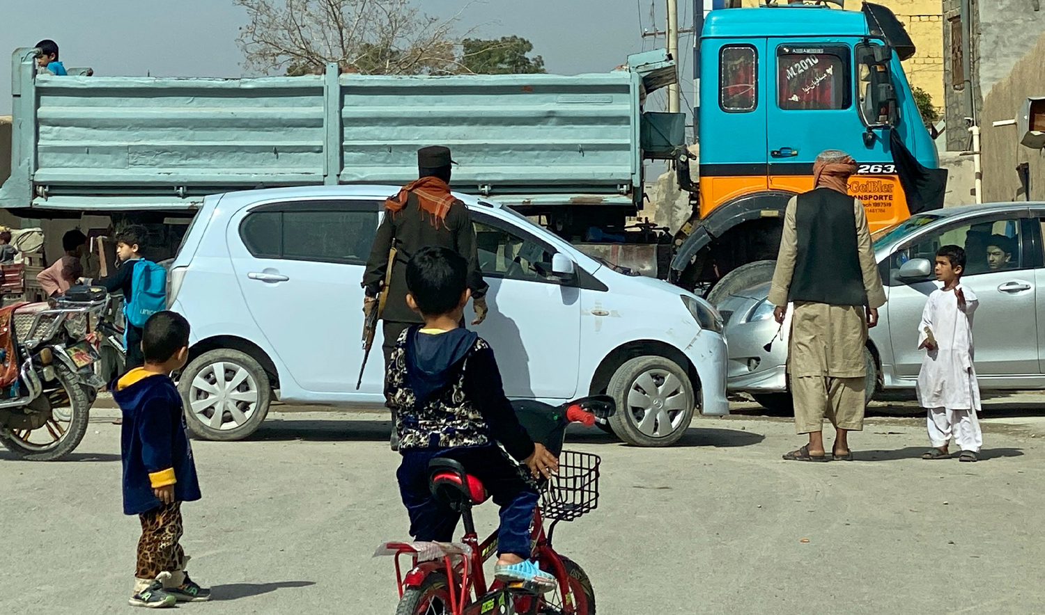 An Afghan security personnel checks a vehicle near the site of a suicide bomb attack in Kandahar on March 21, 2024. (AFP/File)