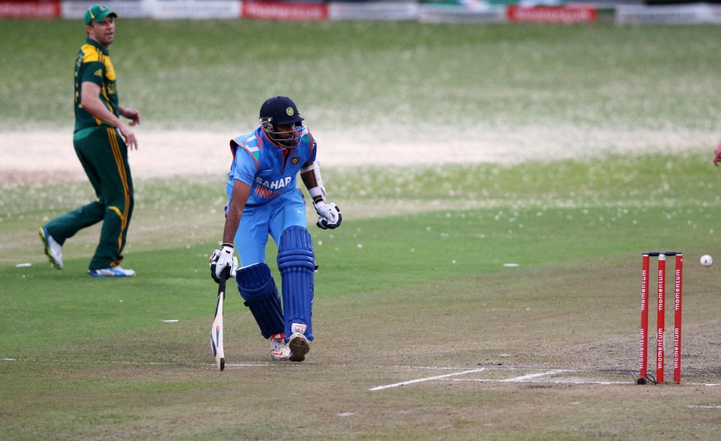 File image of India's cricketer Ravichandra Ashwin is almost run out during the one day International (ODI) Cricket Match between India and South Africa at the Sahara Stadium Kingsmead in Durban on December 8, 2013. (AFP)