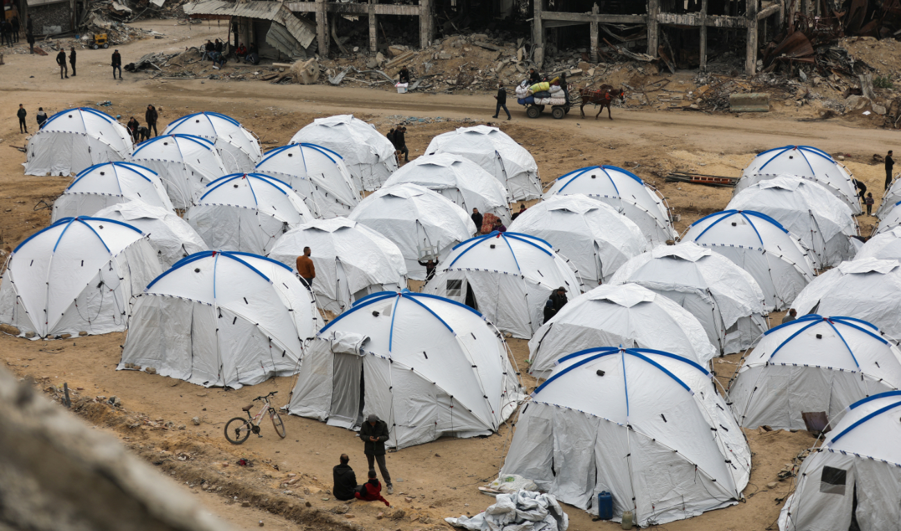 Palestinians set up a new tent camp to shelter people expected to return to northern Gaza after being displaced to the south following a ceasefire between Israel and Hamas, in Gaza City, January 22, 2025. (Reuters)
