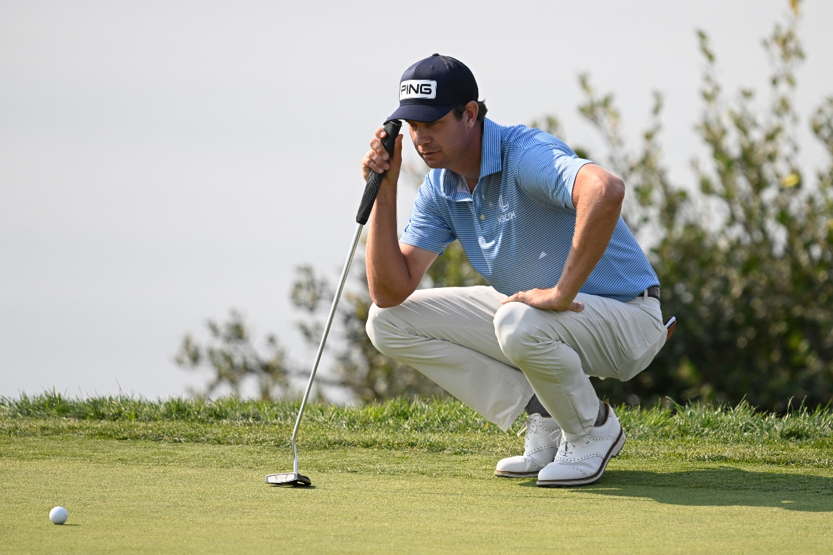 Harris English lines up a putt on the fourth hole on the South Course at Torrey Pines during the third round of the Farmers Insurance Open golf tournament Friday in San Diego. (AP)