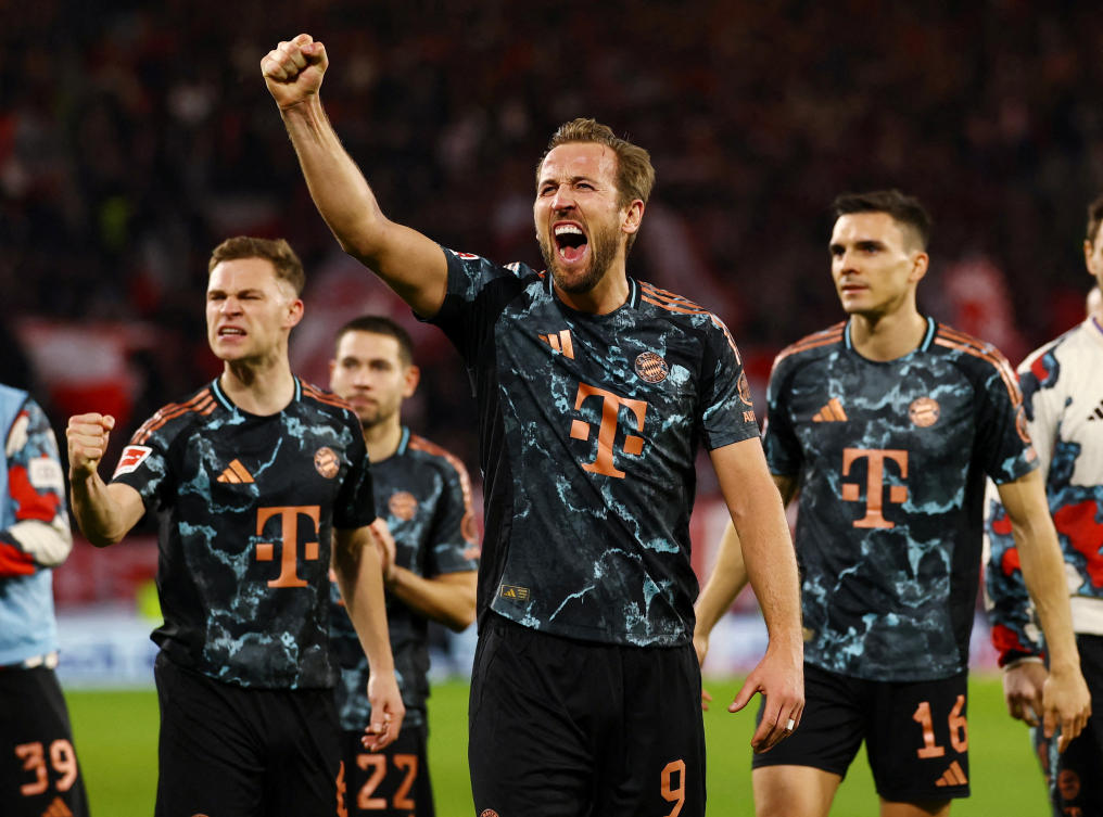 Bayern Munich’s Joao Palhinha, Joshua Kimmich and Harry Kane celebrate after their Bundesliga match against SC Freiburg at Europa Park Stadion, Freiburg, January 25, 2025. (Reuters)