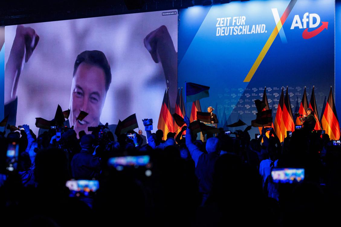US tech billionaire and businessman Elon Musk is seen on a large screen as Alice Weidel, co-leader of Germany’s far-right Alternative for Germany (AfD) party, addresses an election campaign rally in Halle, eastern Germany on Jan. 25, 2025. (AFP)