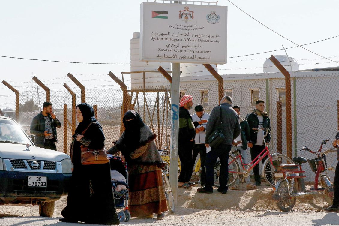 Syrian refugees wait for departure approvals to return to their contry at the Zaatari camp, near the Jordanian city of Mafraq on Jan. 13. (AFP)
