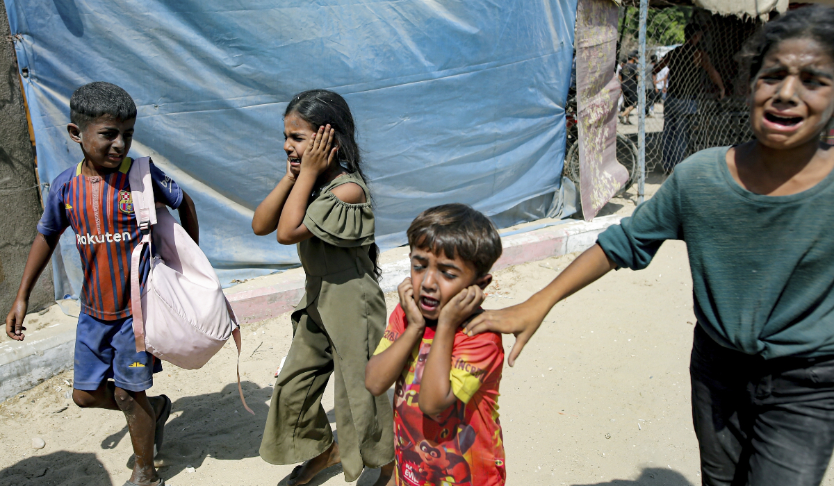Palestinian children queue at a food distribution kitchen in Deir al-Balah, Gaza Strip, Thursday Nov. 28, 2024. (AP)