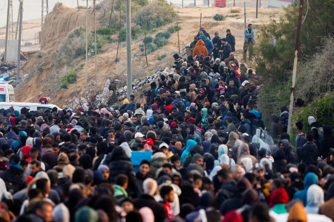 Palestinians wait to be allowed to return to their homes in northern Gaza after they were displaced to the south at Israel's order during the war, amid a ceasefire between Israel and Hamas, in the central Gaza Strip, January 26, 2025. (Reuters)