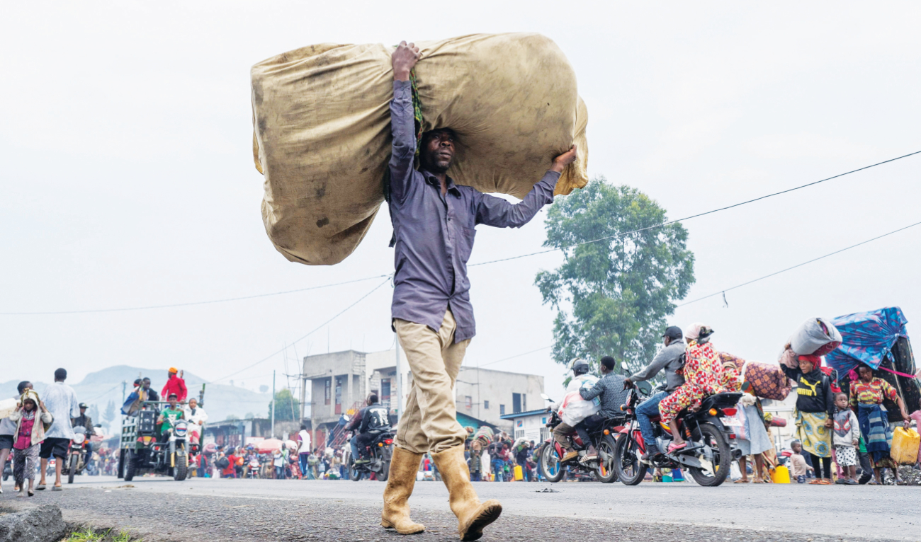 Internally displaced civilians flee Goma following the fight between M23 rebels and the armed forces. (Reuters)