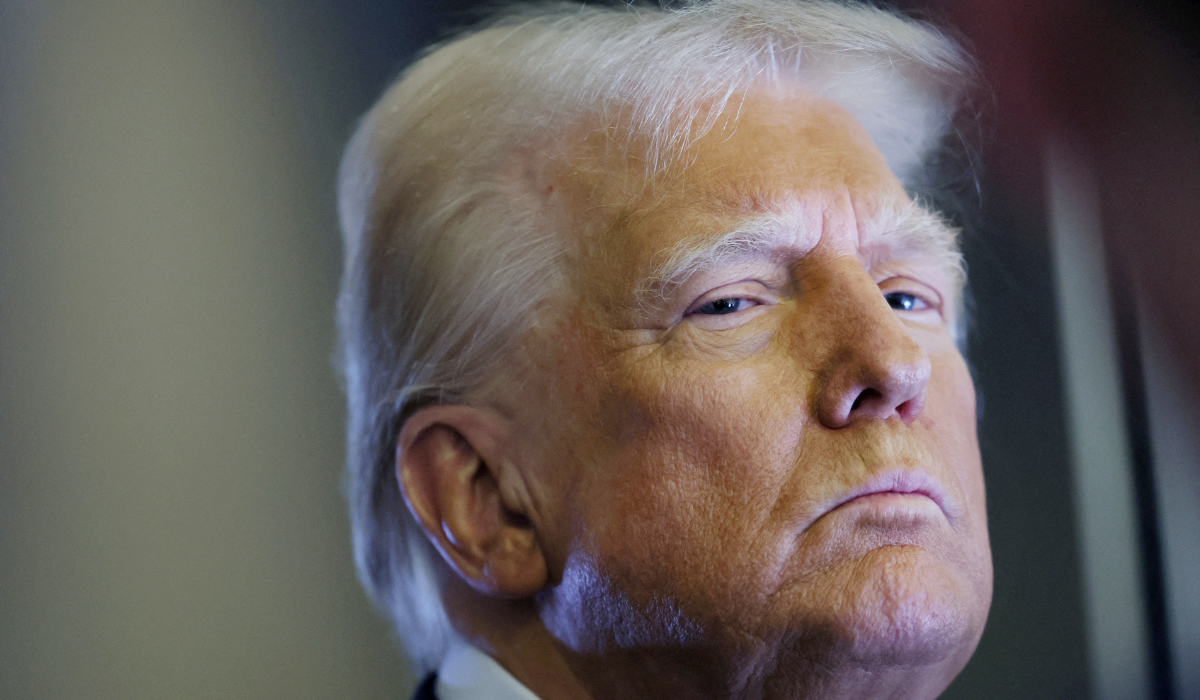 U.S. President Donald Trump looks on as reporters ask questions aboard Air Force One during a flight from Las Vegas, Nevada, to Miami, Florida, U.S., January 25, 2025. (REUTERS)