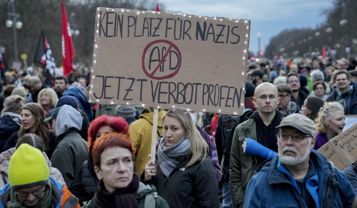 People gather to protest against the far-right Alternative for Germany, or AfD party, and right-wing extremism in front of the Brandenburg Gate in Berlin, Germany, Saturday, Jan. 25, 2025. (AP)