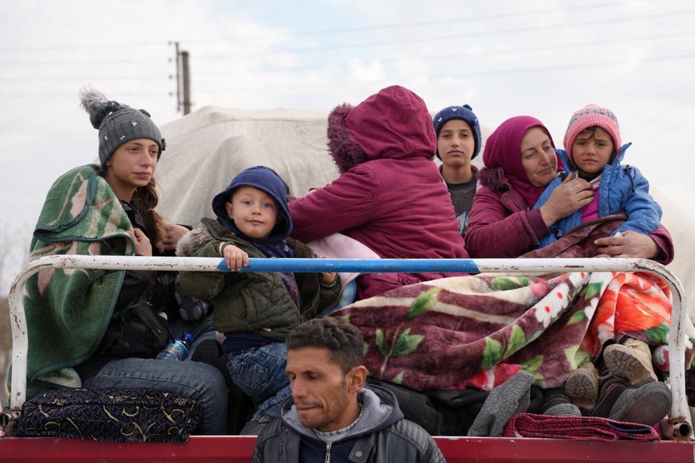 After opposition groups seized control of Syria’s major cities, thousands displaced to neighboring countries by the 13-year civil war have begun returning to their homes. (AFP)