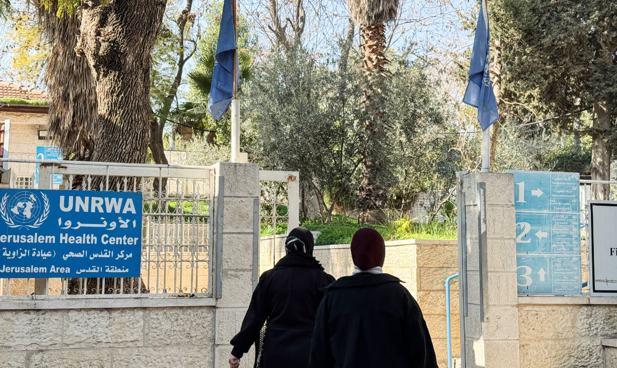 Women enter an United Nations Relief and Works Agency for Palestine Refugees in the Near East (UNRWA) Jerusalem Health Center in Jerusalem's Old City, January 27, 2025, (Reuters)