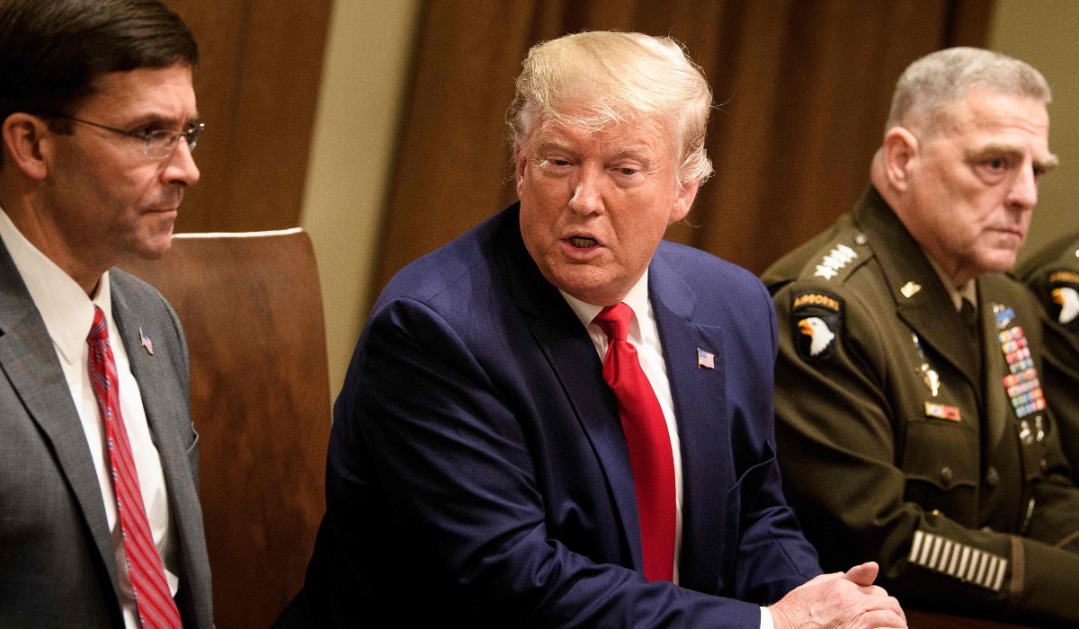 In this file photo taken on October 7, 2019 US Secretary of Defense Mark Esper (L) and Chairman of the Joint Chiefs of Staff Army General Mark A. Milley (R) listen while US President Donald Trump speaks before a meeting with senior military leaders in the Cabinet Room of the White House in Washington DC. (AFP)