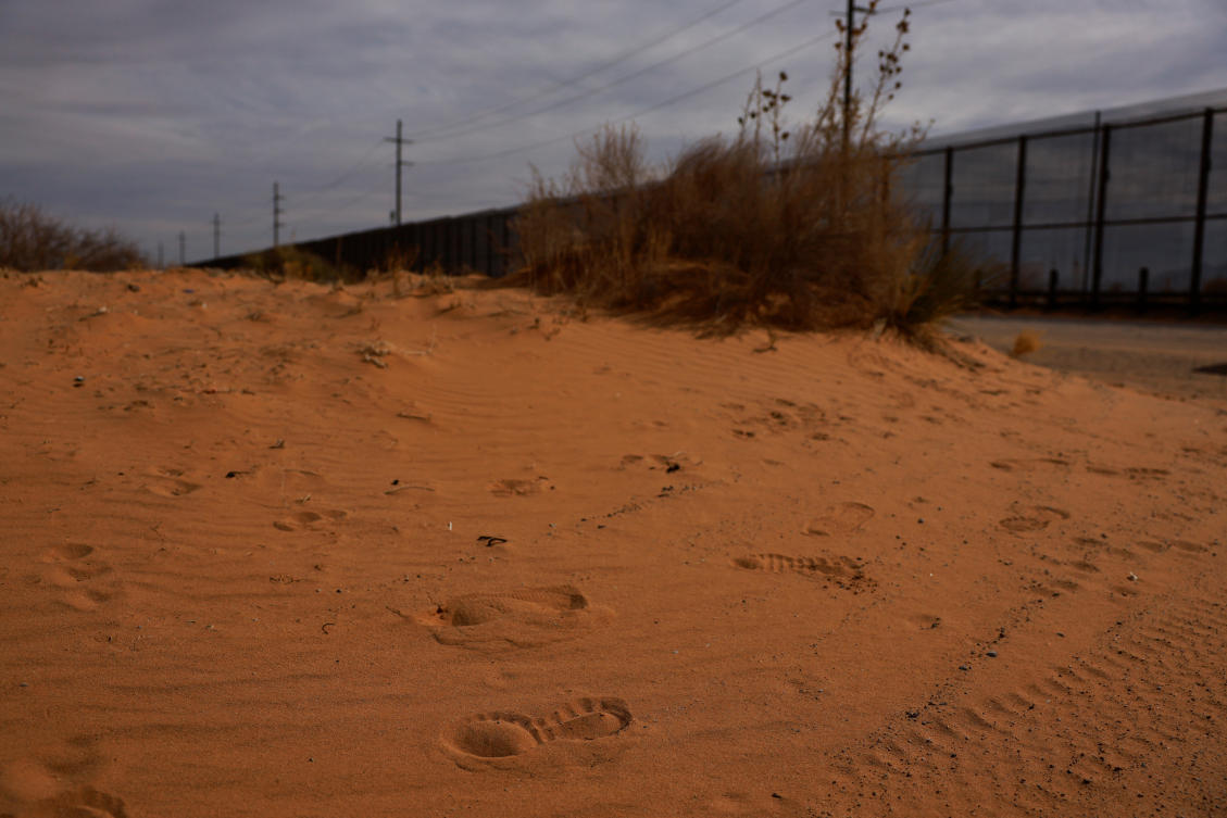 Footprints are seen in the desert, after migrants entered the United States undetected through a hole in a section of the U.S.-Mexico border wall, in Sunland Park, New Mexico, January 28, 2025. (Reuters)