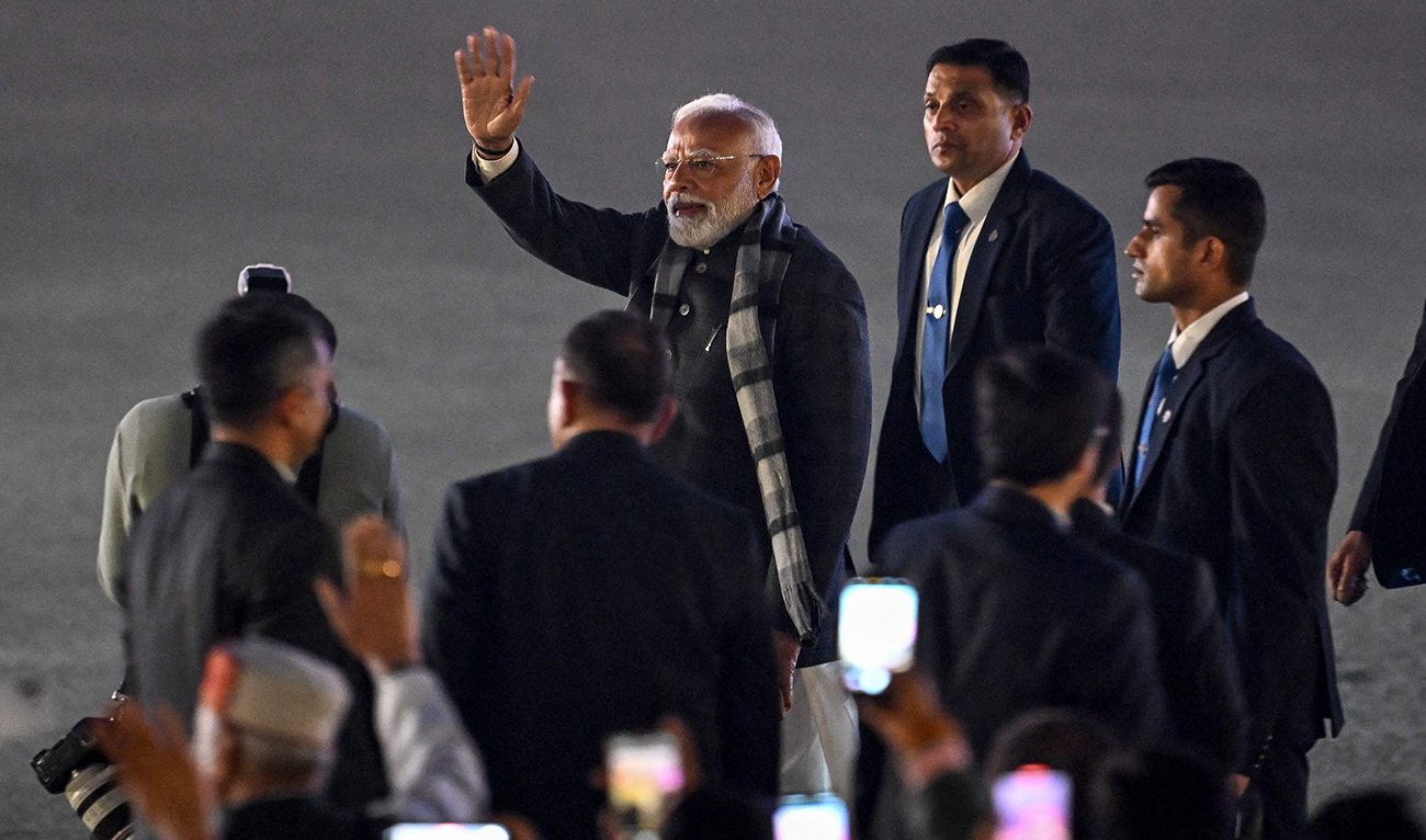 Indian Prime Minister Narendra Modi gestures toward the crowd after attending the “Beating the Retreat” ceremony in New Delhi on January 29, 2025. (AFP)