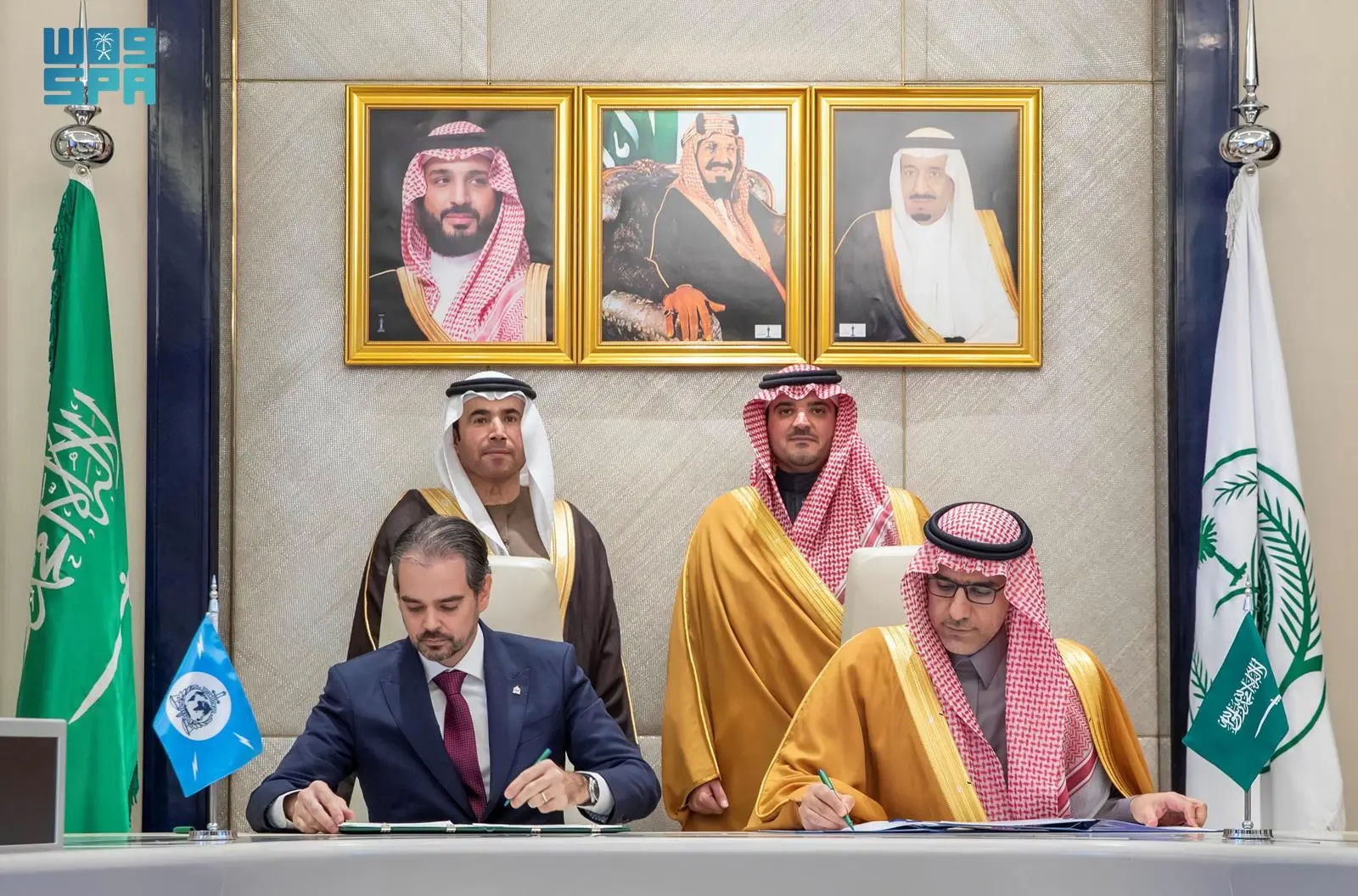 Hisham Al-Faleh, undersecretary at the Kingdom’s Ministry of Interior, and Jurgen Stock, secretary-general of the international police organization, signed a host country agreement. (SPA)
