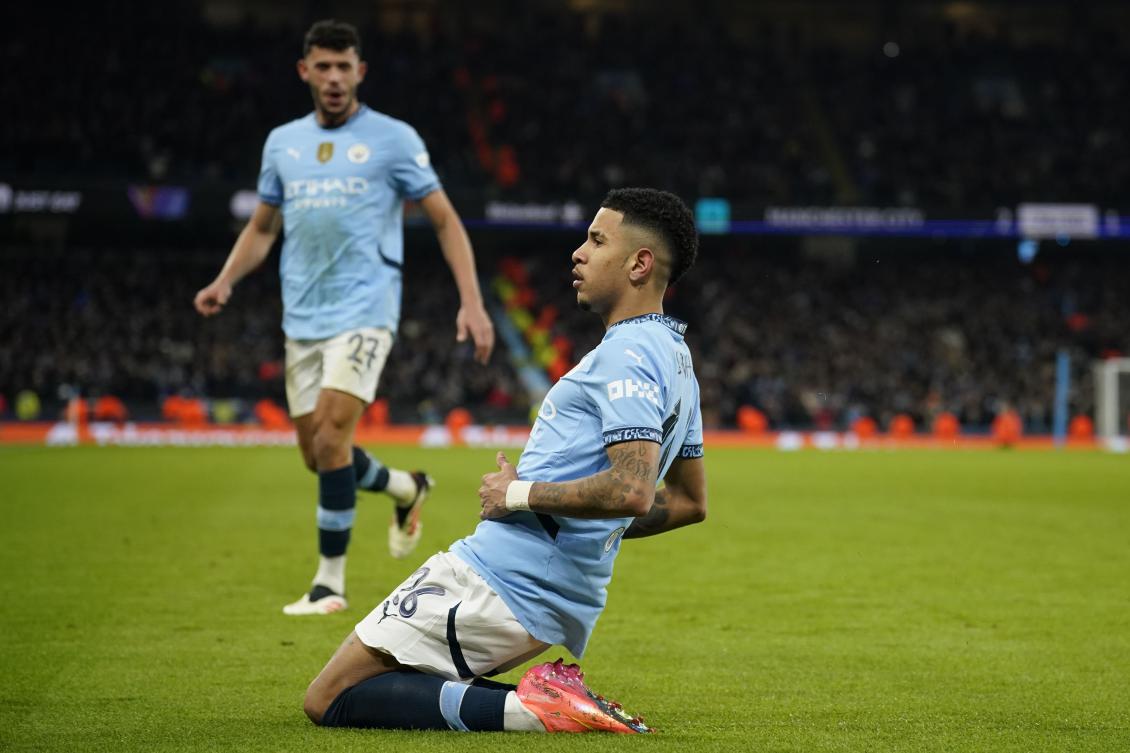 Manchester City's Savinho celebrates after scoring. (AP)