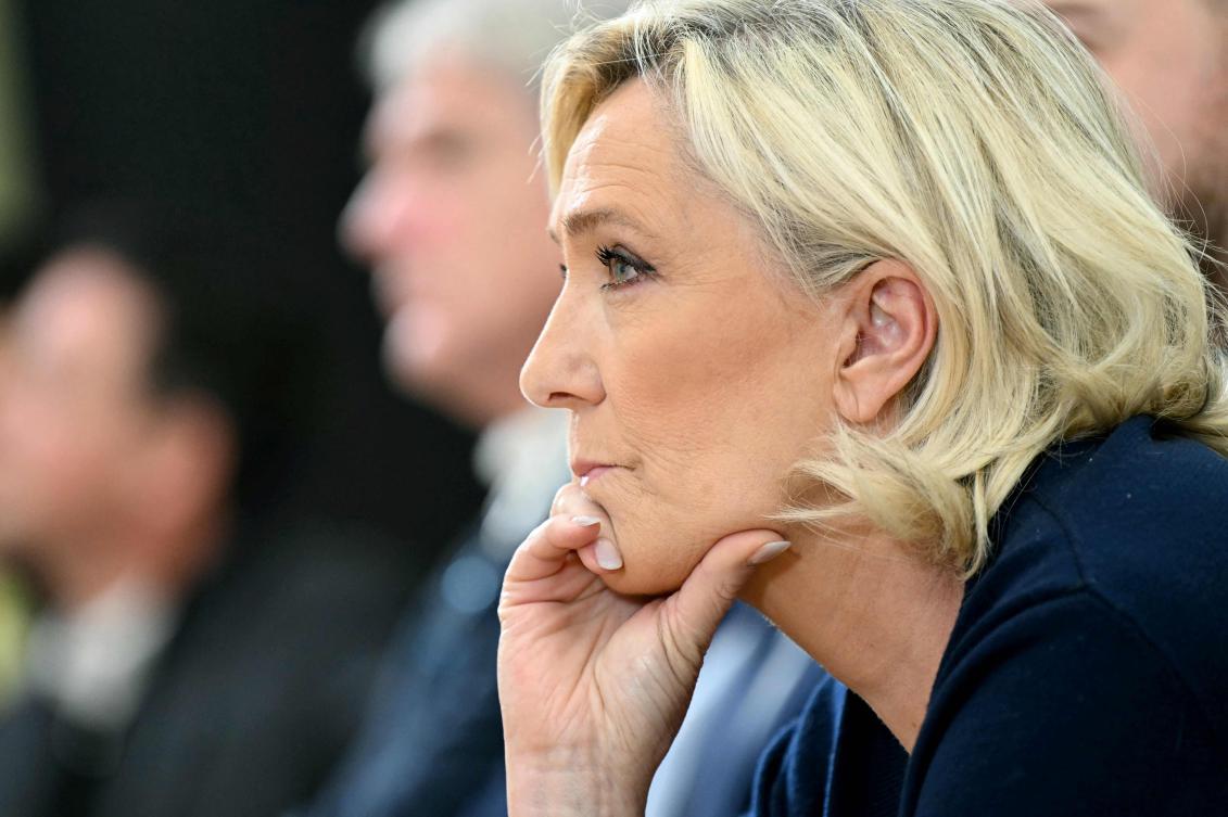 President of the French far-right Rassemblement National (RN) parliamentary group Marine Le Pen listens on as she attends the party’s New Year greetings at Maison de la Chimie, an international conference center in Paris on Jan. 27, 2025. (AFP)