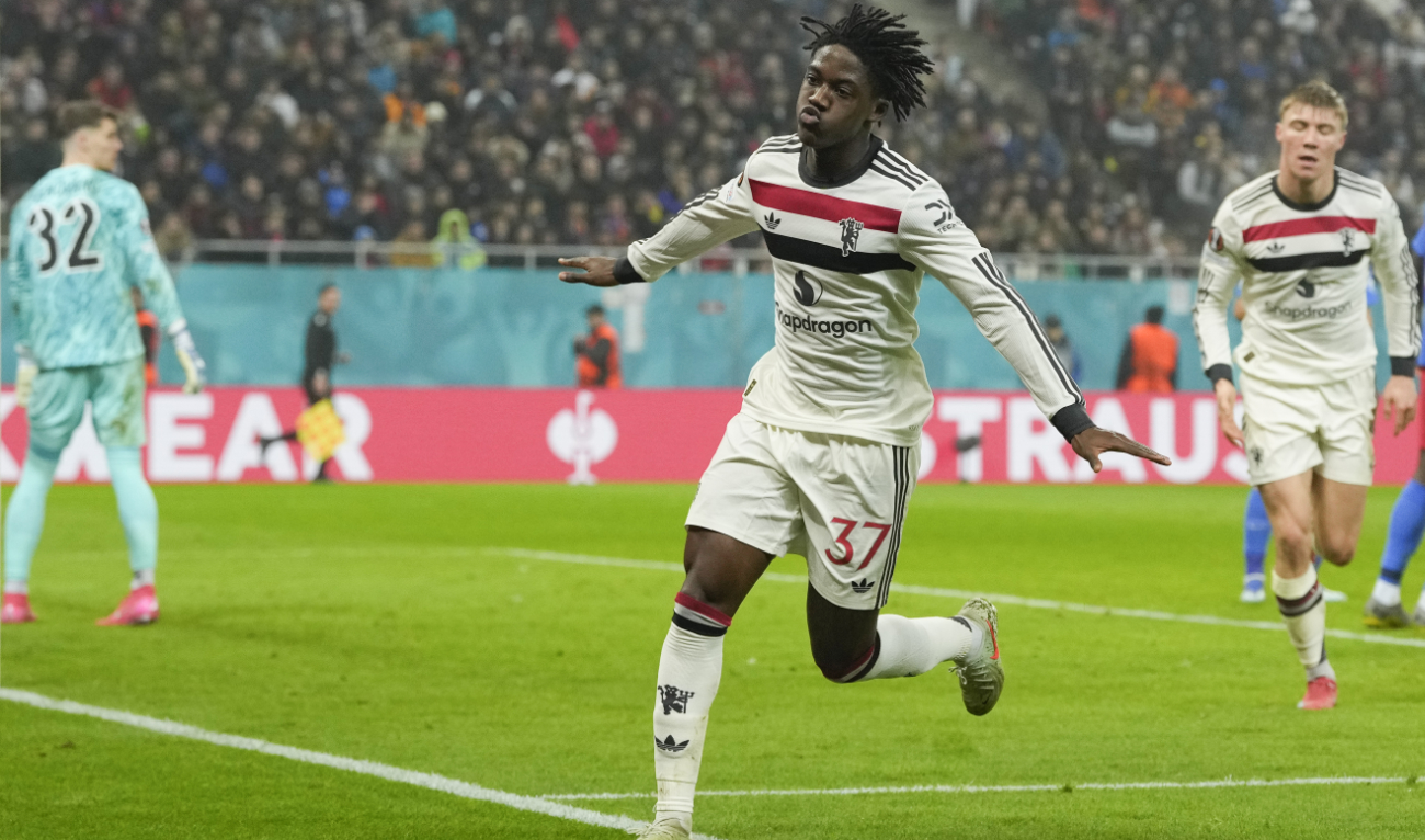 Manchester United’s Kobbie Mainoo celebrates after scoring his side’s second goal during the Europa League league phase soccer match between FCSB and Manchester United at the National Arena stadium, Thursday. (AP)