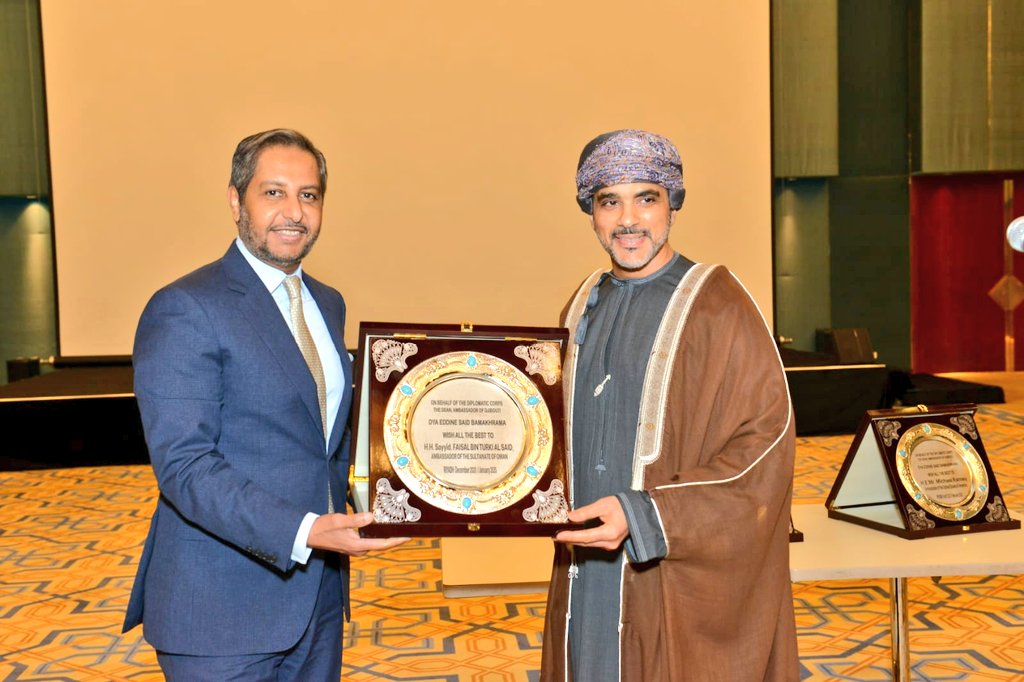Outgoing Oman ambassador Sayyid Faisal bin Turki receiving a souvenir from Dean of the diplomatic corps Dya-Eddine Said Bamakhrama at a Farwell organized by him (Dean of Diplomatic Corps)