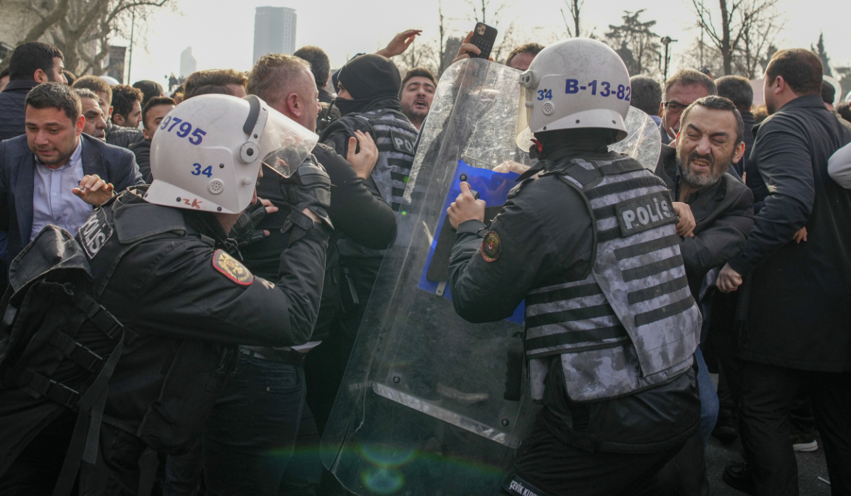 Turkish police officers clash with Istanbul's Mayor Ekrem Imamoglu supporters as they gather in front of the Istanbul courthouse, in Istanbul, Turkey, Friday, Jan. 31, 2025. (AP)