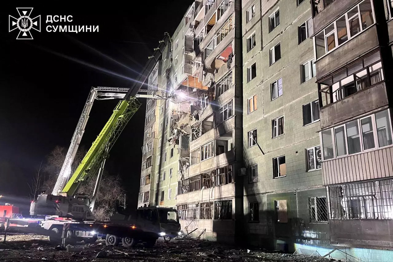 Ukrainian rescuers work to extinguish a fire in a residential building in Sumy following a Russian missile attack on Jan. 30, 2025. (Ukrainian Emergency Service handout photo via AFP)