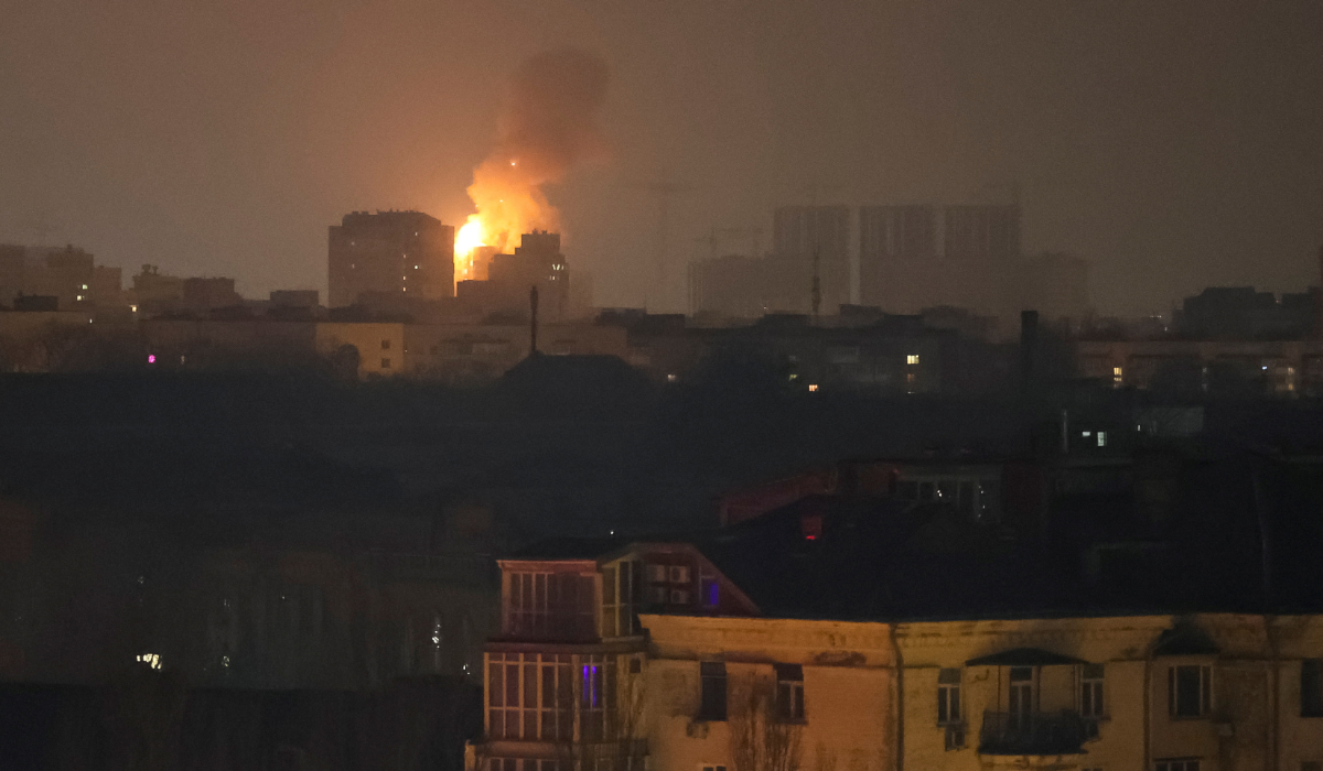 An explosion of a drone after it hit an apartment building is seen in the sky during a Russian drone strike, in Kyiv. (REUTERS)