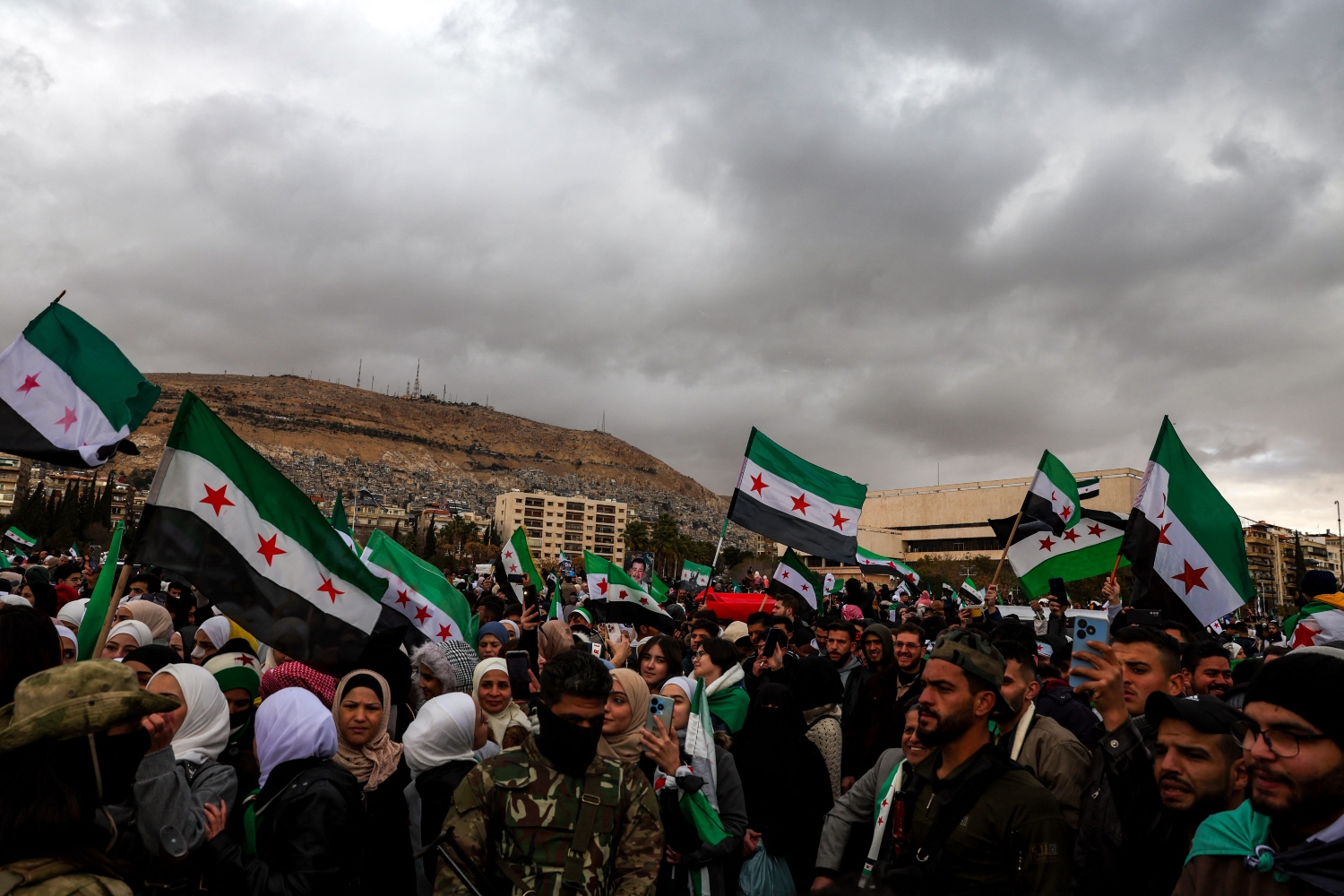 The new Syria is transitioning from a police state to a state of institutions that is part of the international community (AFP)