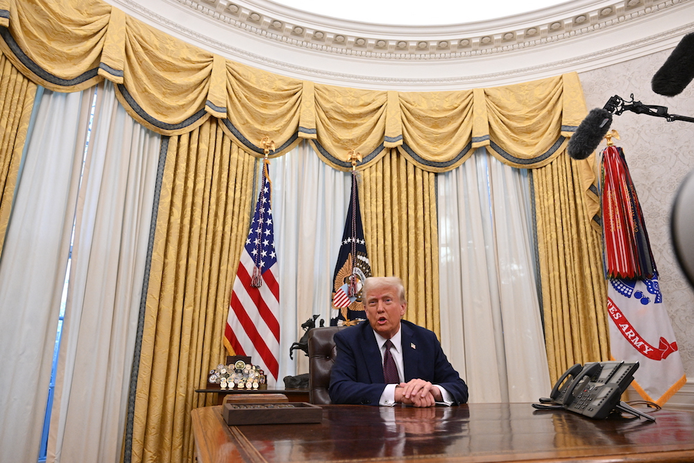 Above, US President Donald Trump in the Oval Office of the White House in Washington, DC, on Jan. 23, 2025. (AFP)