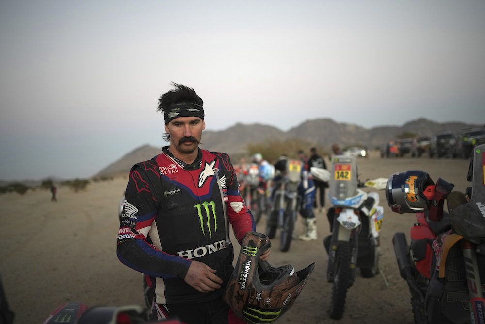 Honda rider Skyler Howes of the US arrives at the bivouac after the stage two, day one of the Dakar Rally in Bisha, Saudi Arabia on Jan. 5, 2025. (AP)