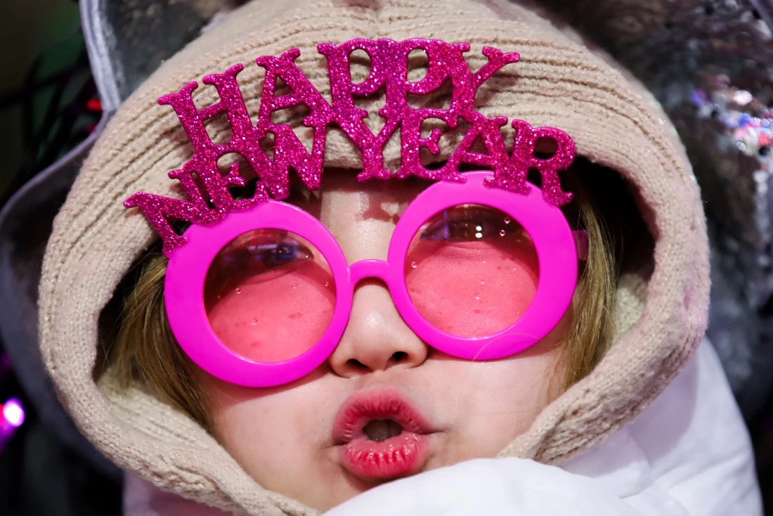 The world welcomes 2025 with light shows, embraces and ice plunges