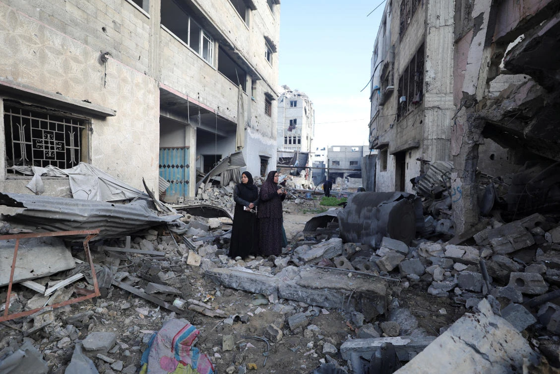 Palestinian women react at the site of an Israeli strike on a house, amid the ongoing conflict between Israel and Hamas, in Gaza City, January 4, 2025. (Reuters)