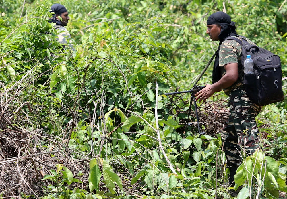 Military personnel patrol the Saranda forest area during an operation against Maoist rebels in the West Singhbhum district of India’s eastern Jharkhand state. (AFP file photo)